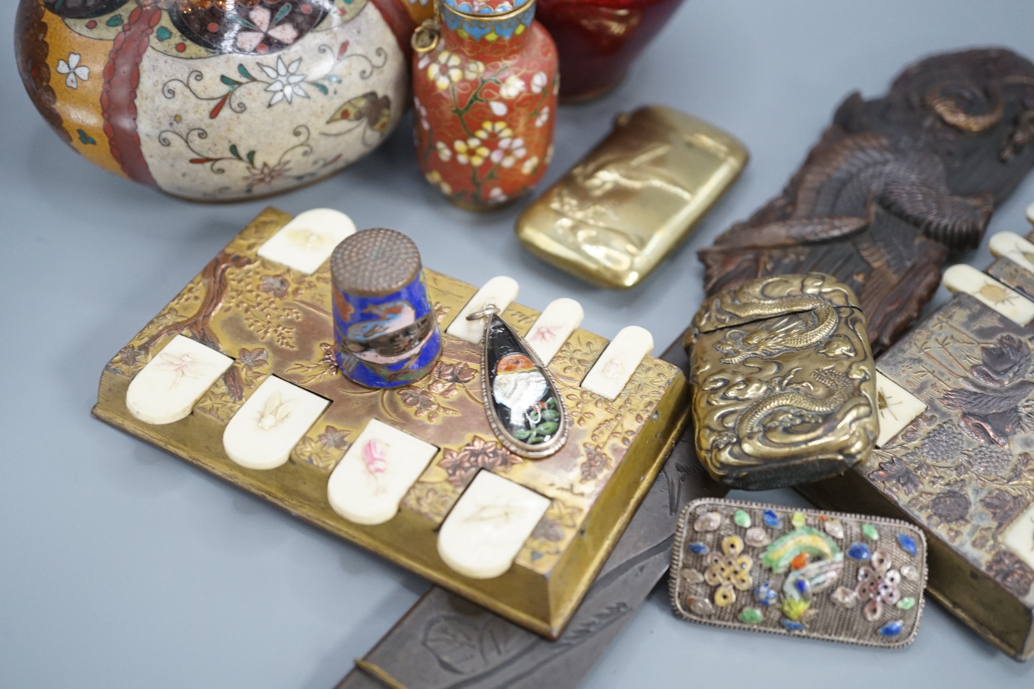 A group of Chinese and Japanese miniature cloisonne enamel vases, 6cm - 12.5cm, a Japanese mixed metal paper knife or page turner and a pair of Japanese antimony and celluloid bezique markers